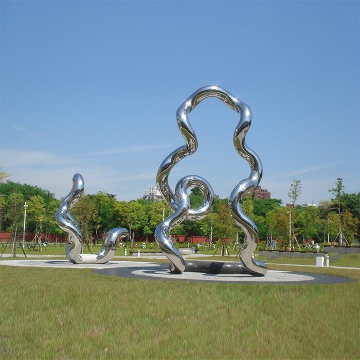 large stainless steel modern garden sculpture
