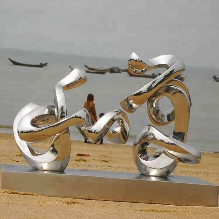 Polished stainless steel human sculptures by sea